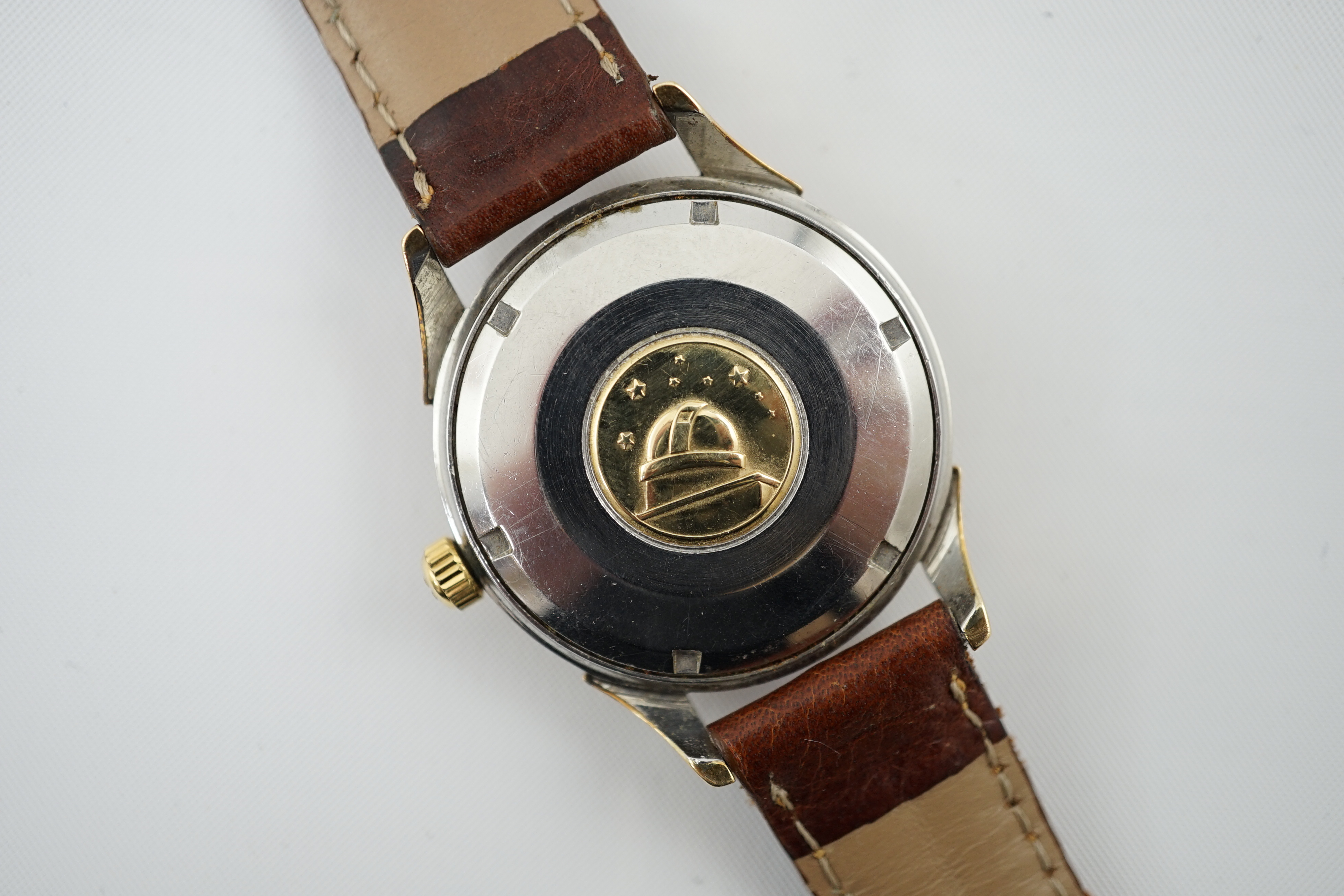 A gentleman's 1960's stainless steel and gold plated Omega Automatic Chronometer Constellation 'pie pan' black dial wrist watch